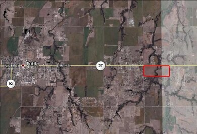 Aerial map of property and surrounding area featuring property parcel outlined