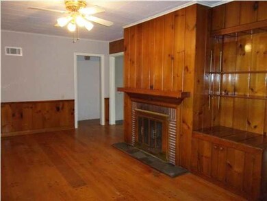 Family room w/ wdburner and built-in bookcases