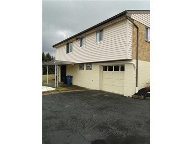 Exterior Back. Added parking