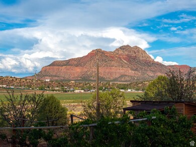 View of mountain background featuring rural landscape