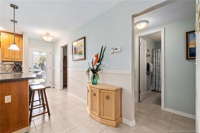 looking bask to the front storm door. 2nd bathroom