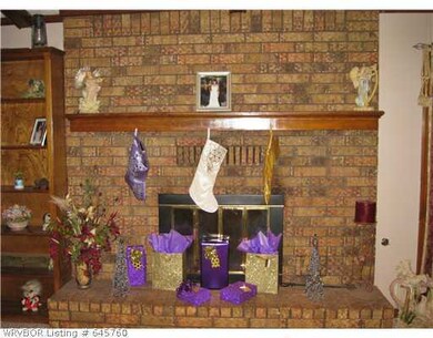 Living Room. Woodburning Fireplace in Living Room