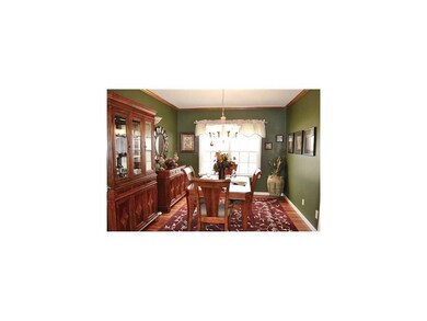 Dining Area. Dining room with cherry hardwood floo