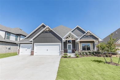 Craftsman-style house with board and batten siding, a front lawn, covered porch, a garage, and concrete driveway