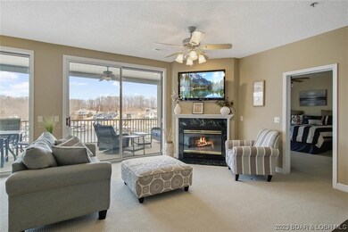 Gas fireplace with oversized sliders to screened d