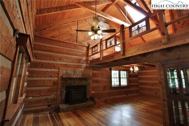 Genuine log cabin with lovely wood floors, high ce