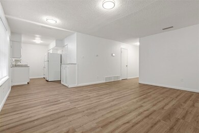 Kitchen opens to living room