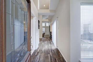Inviting entry way with updated engineered wood fl