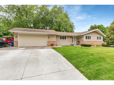 The home features an attached 2 stall garage that'