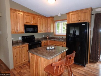 Custom maple raised panel cabinets