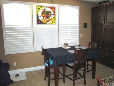 Breakfast nook area off family room and kitchen.