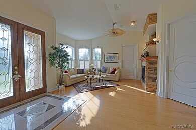 Front entry with marble and stone mosaic, and bamb