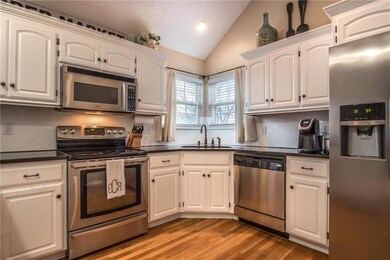 This kitchen is fully equipped with a side-by-side
