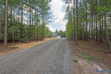 View of dirt / gravel driveway
