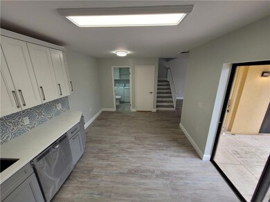 Kitchen (view storage/bathroom)