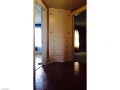 Custom built-ins and gorgeous hardwood throughout 