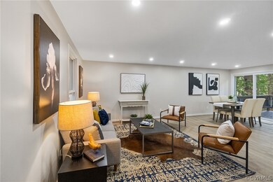 Living room with hardwood / wood-style floors