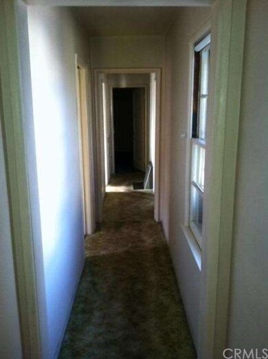 Hallway connecting 3 bedrooms & 2 bathrooms