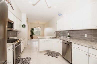 Kitchen features beautiful granite countertops and