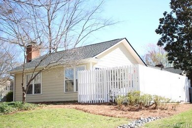 Side Exterior.  Note: Privacy Wall Surrounds Deck/