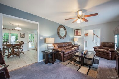 Family room opening to the eat-in area of the kitc