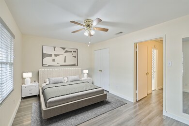 Spacious primary bedroom on the second floor with