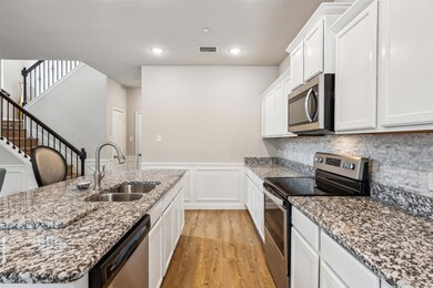 An abundance of cabinets and countertops!
