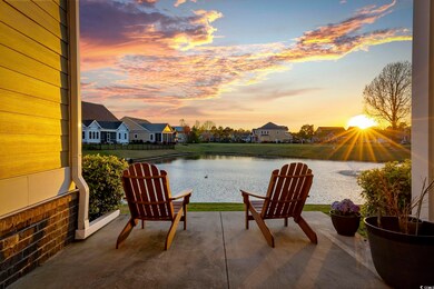 View of patio / terrace with a water view