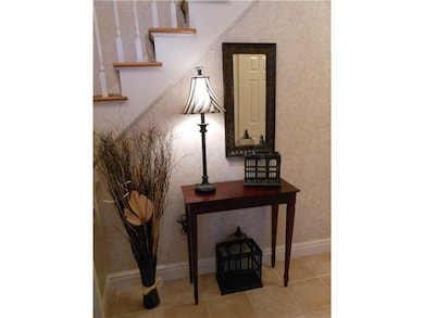 Entry/Foyer. The two-story foyer features a pretty