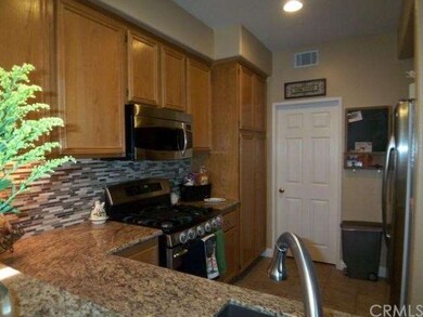 Breakfast counter + kitchen has access to laundry 