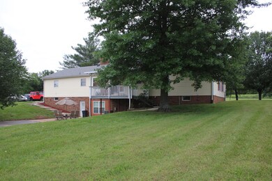 Large Covered Deck on Back of Home