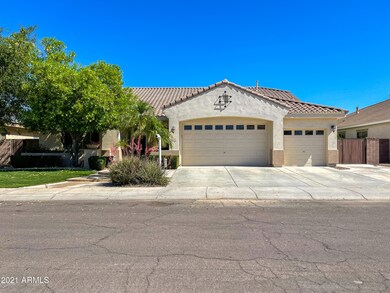 3 Car garage/ RV gate
