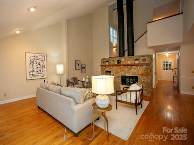Large living room with a soaring vaulted ceiling!