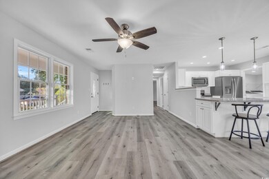 Unfurnished living room with light hardwood / wood