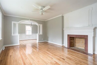 Oversized living room with fabulous refinished har