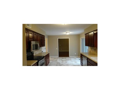 Updated kitchen with SS appliances, solid surface 