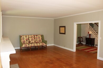 Den off to the left of the main enteranc