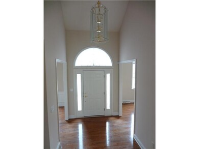 Entry/Foyer. Two story entry and hardwood flooring