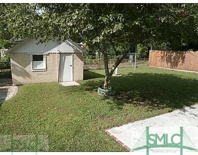 Exterior Back. outbuilding was once a Barbershop! 