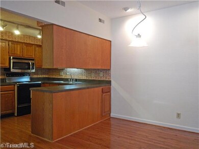 Kitchen. Kitchen opens onto Dining Room