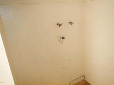 Washer hookup next to kitchen