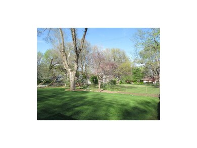 Notice the thick green perfectly manicured lawn an