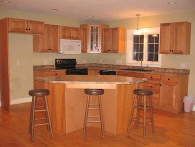 Island with pull out shelving.