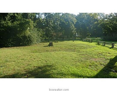 Land/Lot. Standing in the middle of the lot lookin