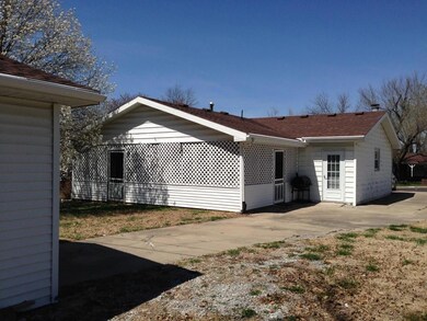 Back of home (looking at screened porch)