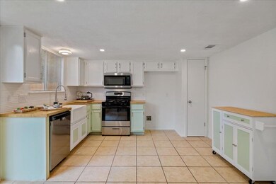 Kitchen featuring appliances with stainless steel