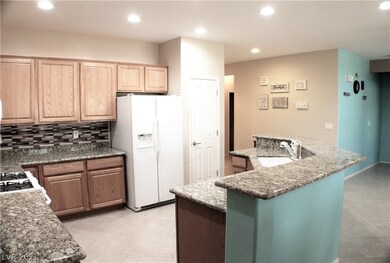 ROOMY KITCHEN BOASTS HUGE BREAKFAST BAR!