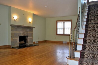 Living Room:  The covered porch leads to the front