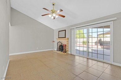 Unfurnished living room featuring baseboards, loft