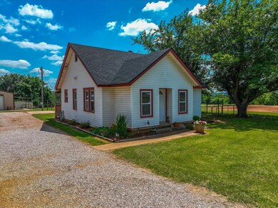 View of front of property with a front lawn